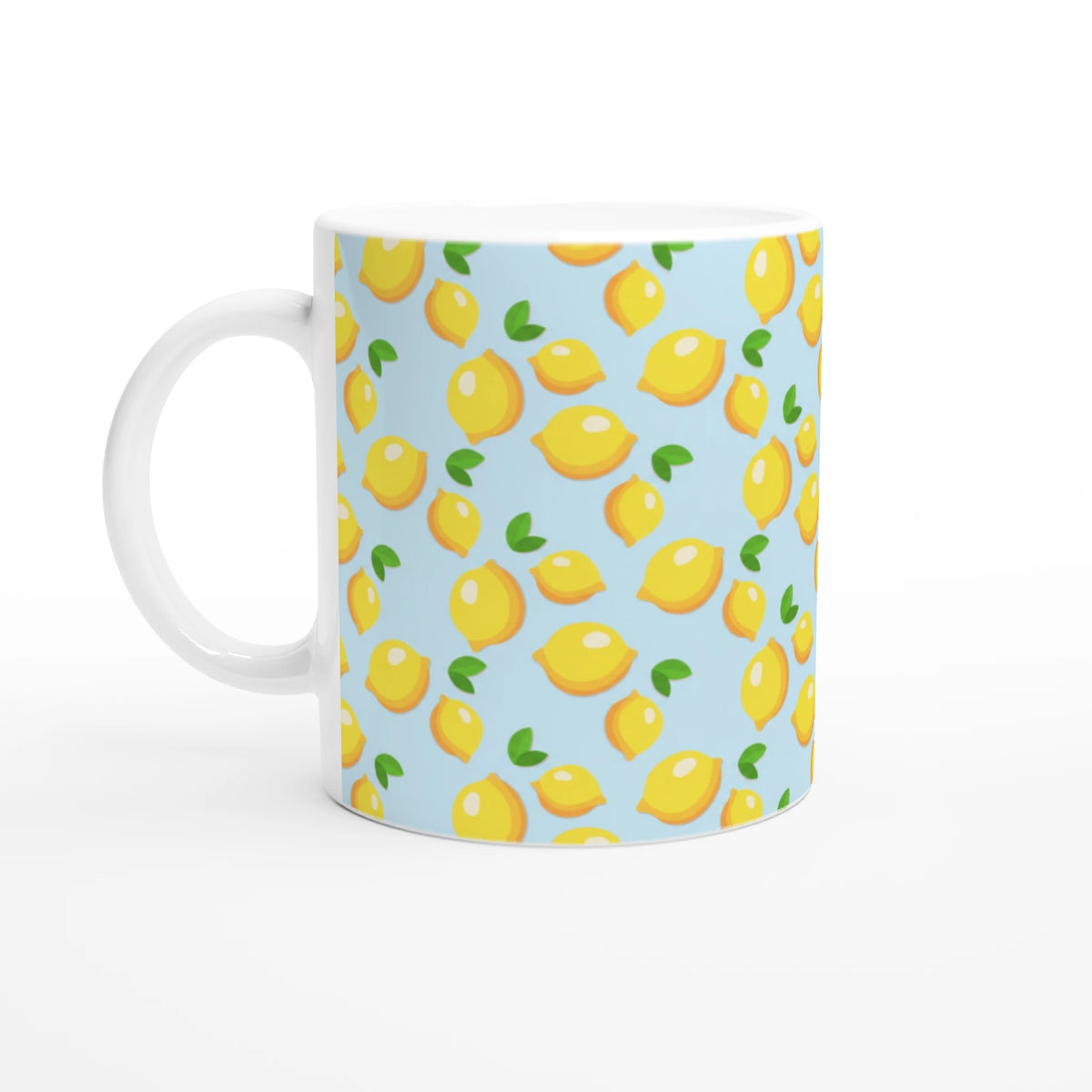 Blue lemon-pattern ceramic mug with white handle, featuring bright yellow lemons and green leaves.