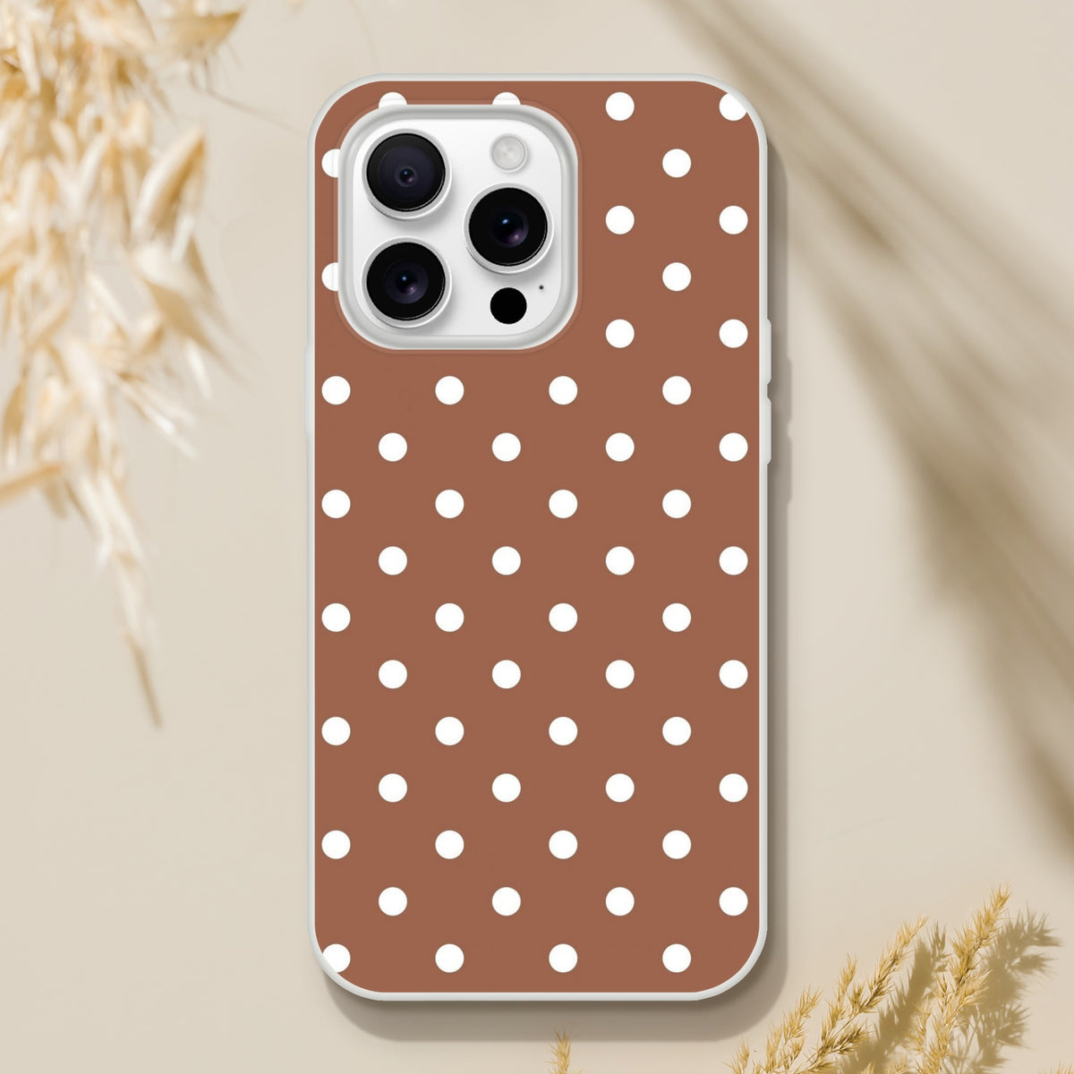 Retro brown and white polka dot iPhone case with matte finish and shock-absorbing TPU protection for models 13-16.