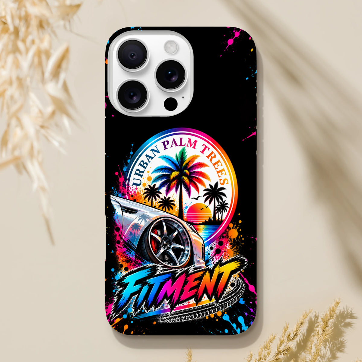Fitment iPhone case with urban palm trees sunset graphic, modified car art, colorful splatter, and streetwear style.
