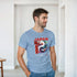 Male model wearing light blue cotton-blend Japanese graphic T-shirt with koi artwork and bold red JAPAN text.