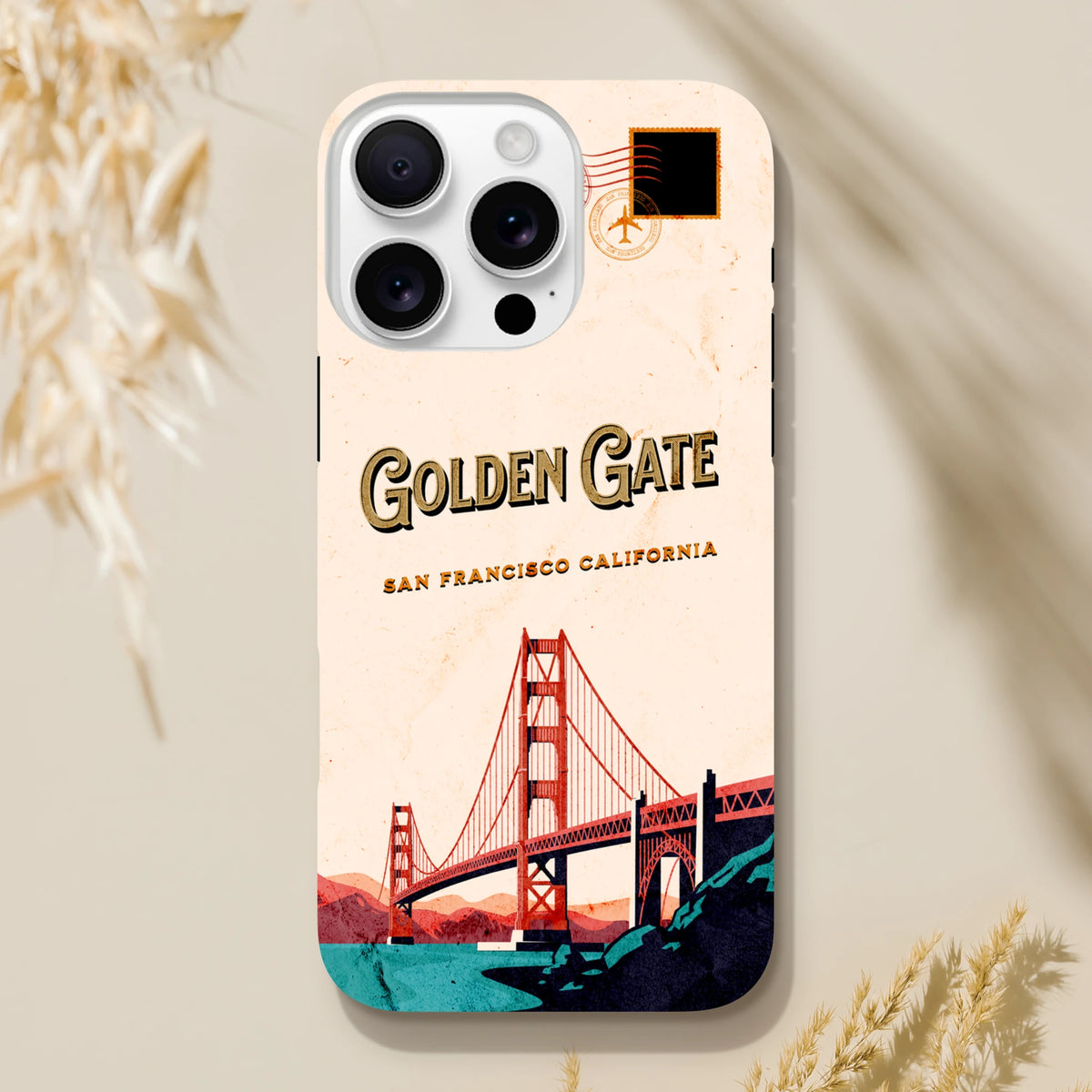 Retro San Francisco iPhone case featuring vintage Golden Gate Bridge postcard design and travel stamp graphic.