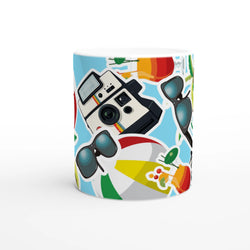 Summer holiday ceramic mug featuring a collage design with a vintage camera, sunglasses, beach ball, and tropical drinks.