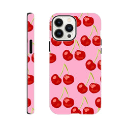 Pink tough iPhone case featuring a cute red cherry pattern wraparound design for street-ready style.