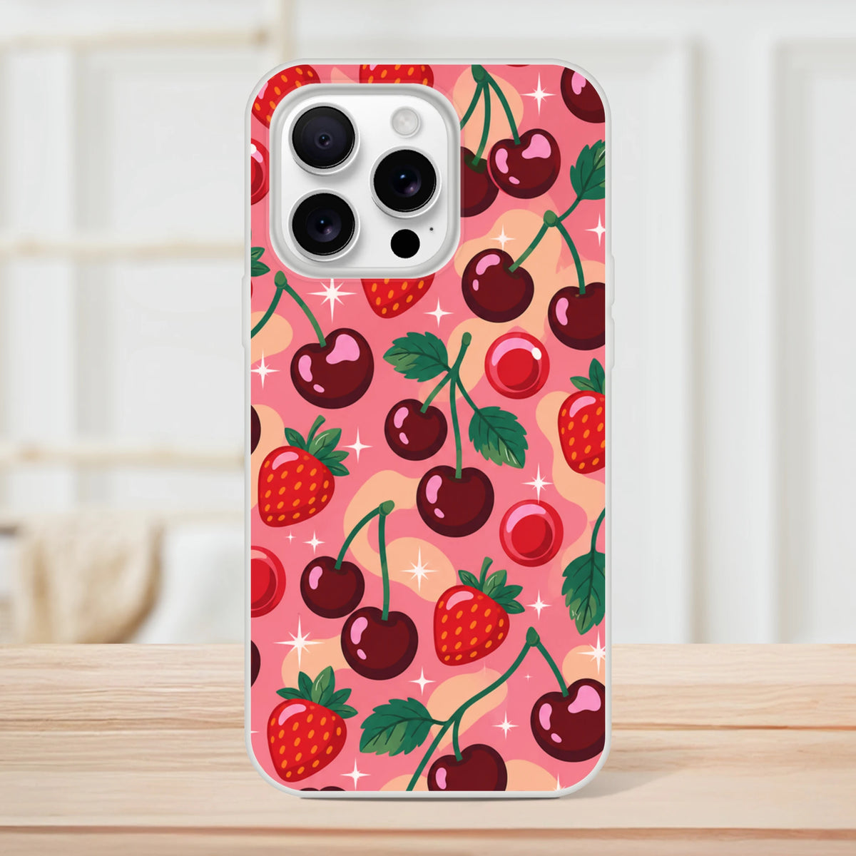 Retro pink iPhone case featuring a retro cherry and strawberry pattern with sparkles, designed for iPhone 13-16 models.