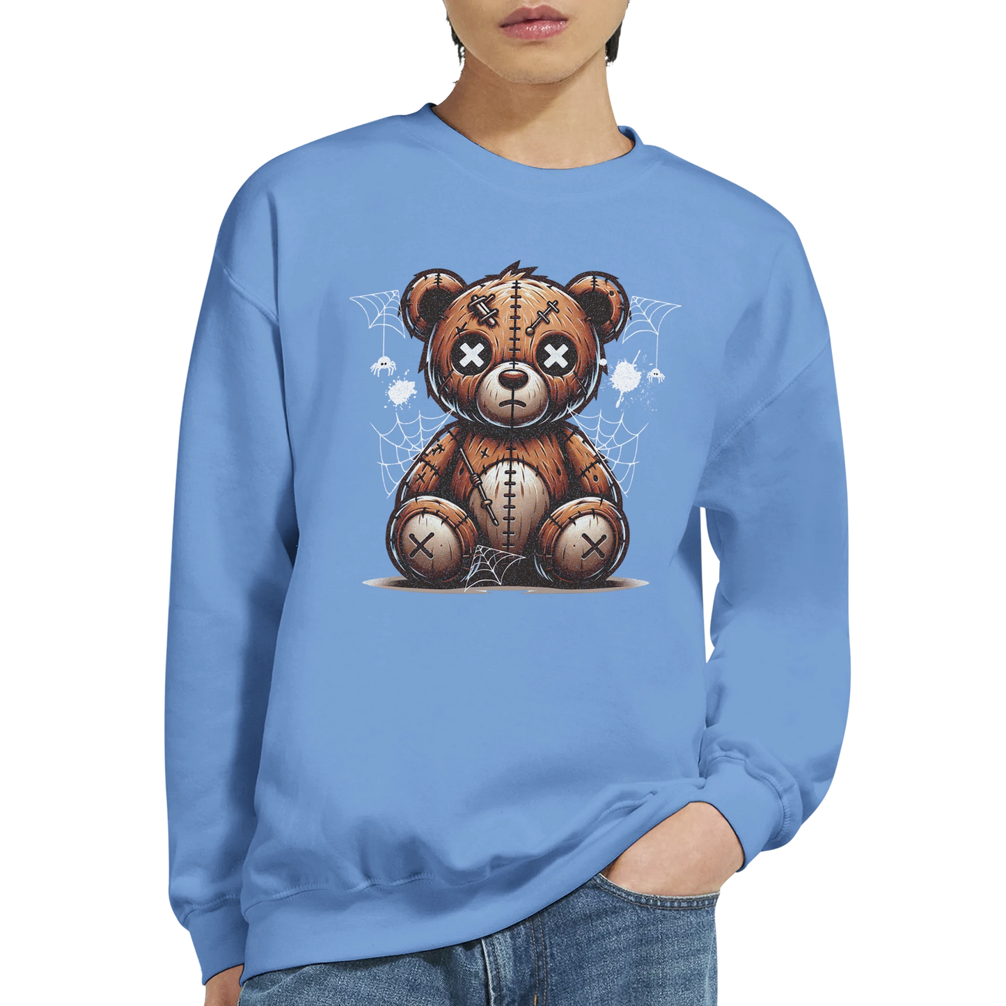Person wearing a blue men's graphic sweatshirt with a teddy bear graphic design on a white background