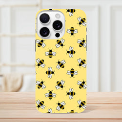 Yellow iPhone case featuring a cute repeating bumble bee pattern on a bright background, offering tough protection for iPhone 13-16 models.