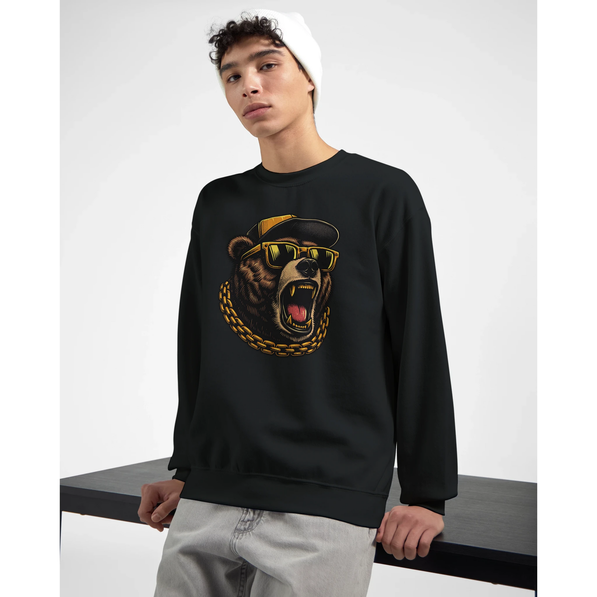 Person wearing a black men's graphic sweatshirt with a bear graphic design on a white background