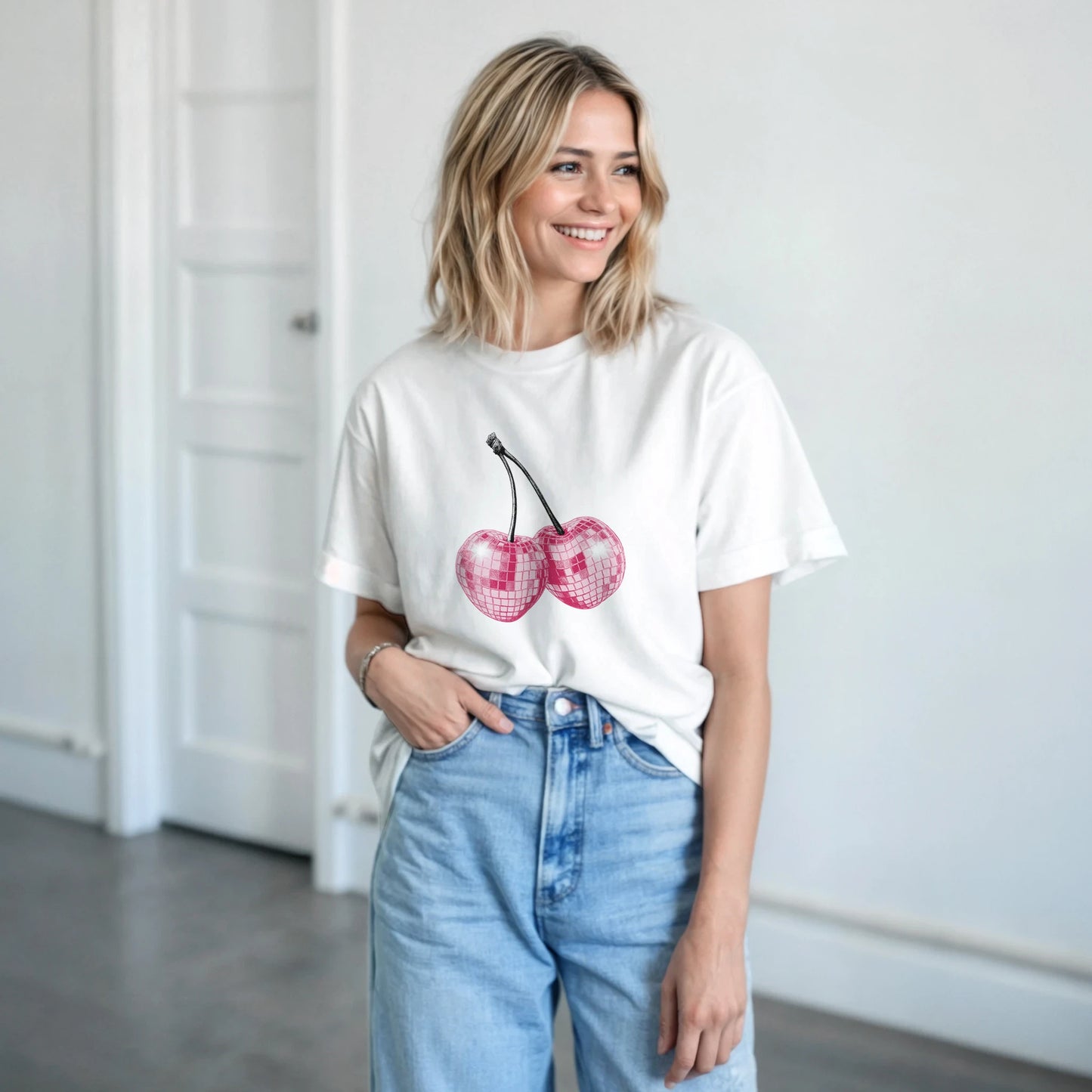 White cotton-blend Glitter Ball Cherries T-Shirt with pink cherry graphic on a casual-wear model.