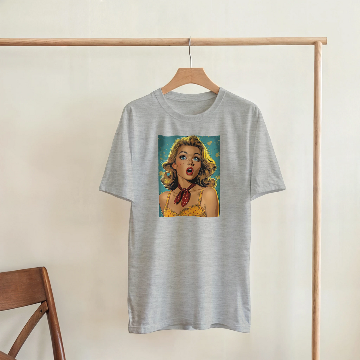 Vintage Pin-Up Graphic T‑Shirt for Men on a wooden rack; retro Americana streetwear tee with bold pin‑up art.