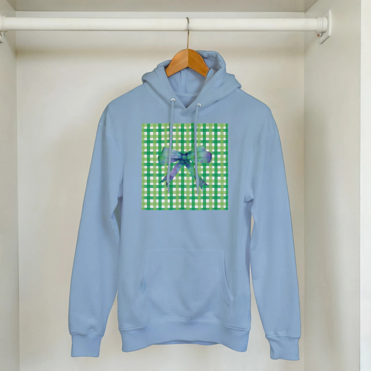 Blue women's hoodie with green gingham bow graphic on chest, cute coquette pullover.