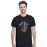 Man wearing black Made in USA graphic short-sleeve T-shirt with circular American flag design.