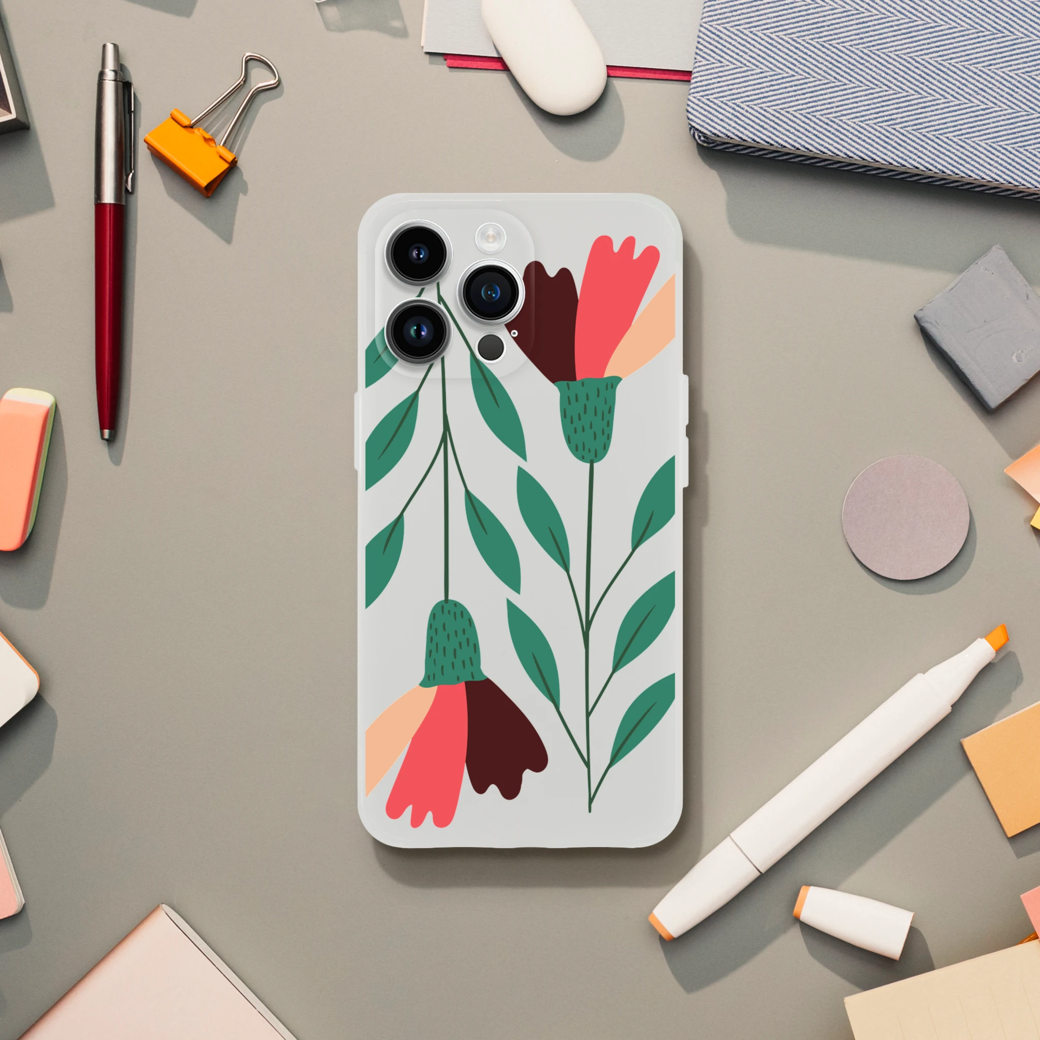 Slim transparent iPhone case with green leaves and coral-pink flowers for iPhone 13–16.