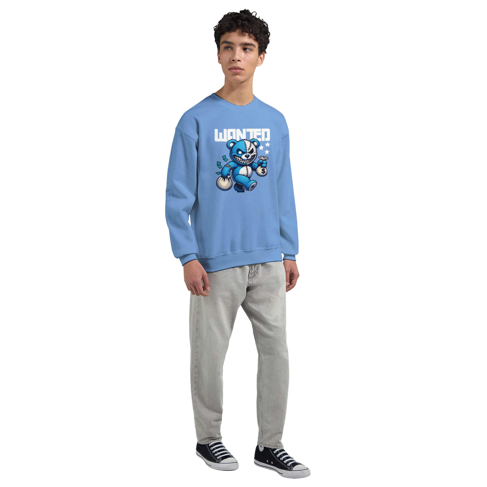 Man wearing a blue men's graphic sweatshirt featuring a teddy bear design