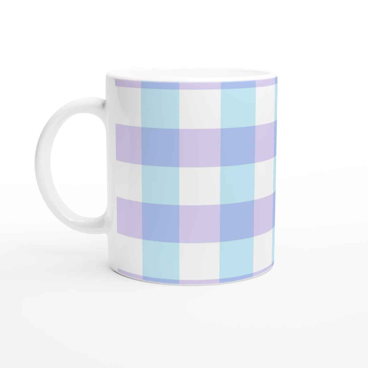 Pastel blue gingham ceramic mug with lavender and light blue checks, a cute checkered coffee cup.