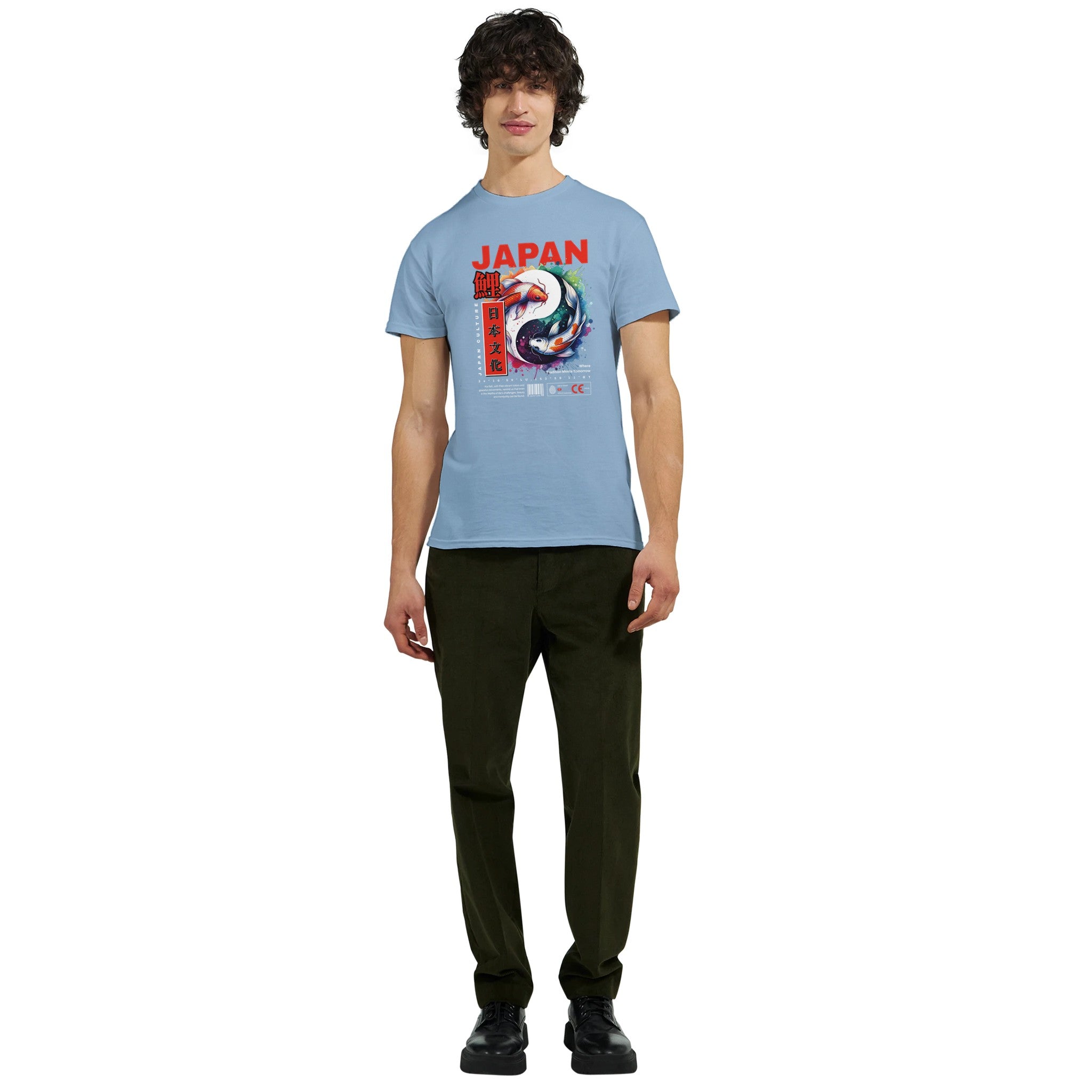 Men's light-blue Japanese graphic T-shirt with bold red JAPAN lettering and koi-style artwork, cotton blend.