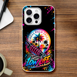 Low Life car culture iPhone case featuring Urban Palm Trees art, pink shock absorber, and colorful neon splatter design on black background.