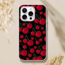 Black iPhone case featuring a scattered retro red cherry pattern with green stems and white bumper.