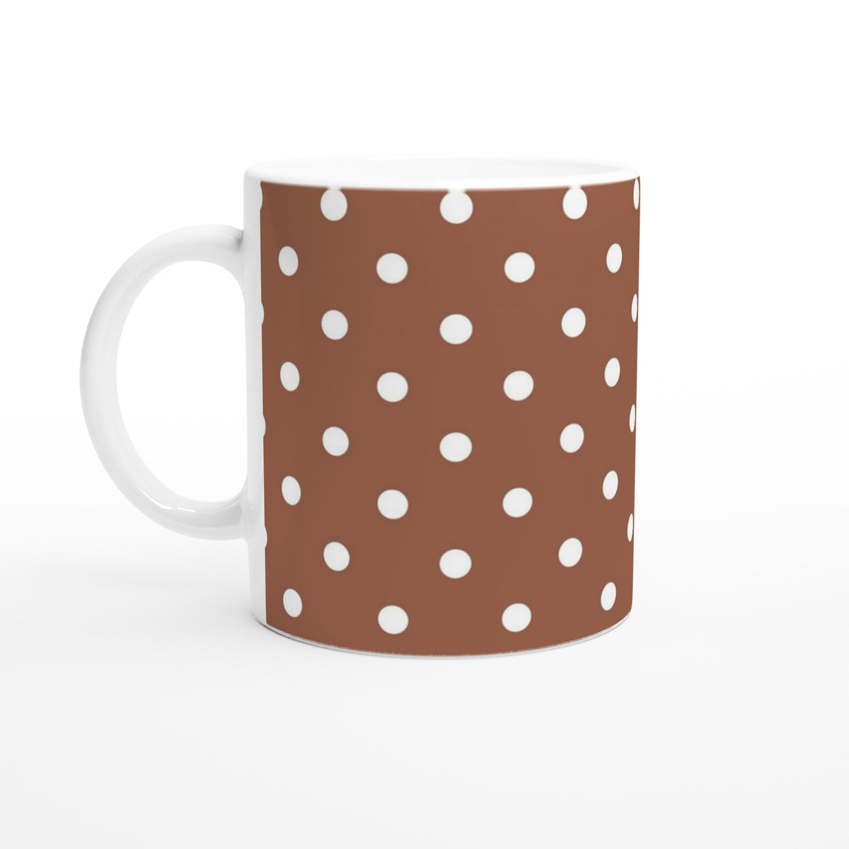 Retro brown ceramic mug featuring a crisp white polka dot spotty pattern. Ideal coffee cup for daily brewing or gifting.