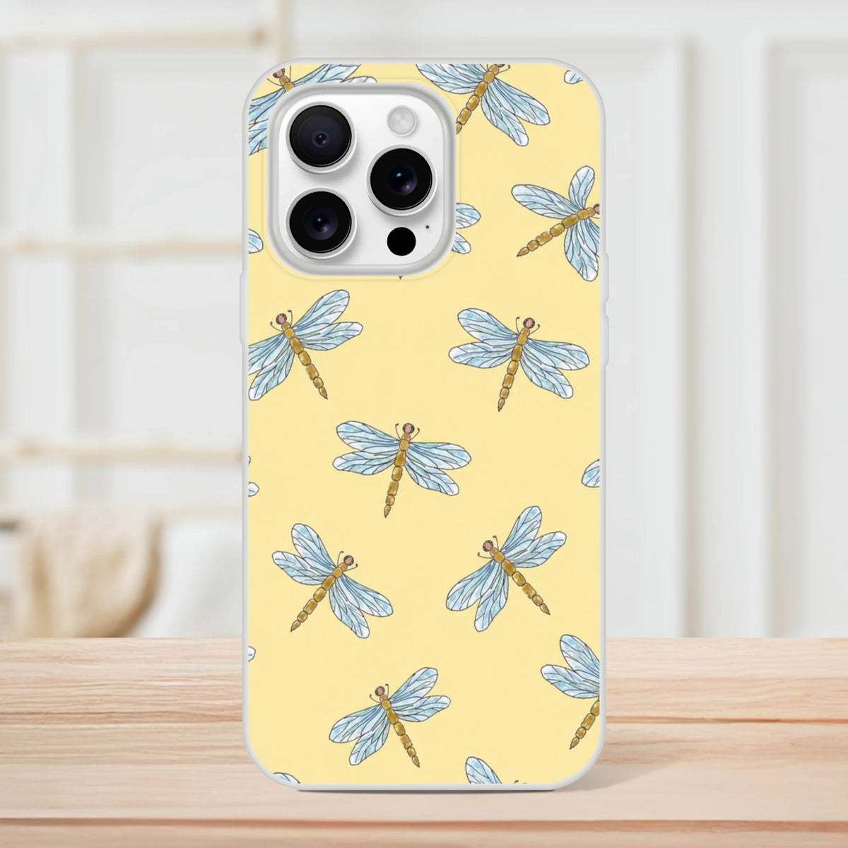 Yellow dragonfly-pattern iPhone case for 13-16, slim shell with blue dragonflies on yellow background.