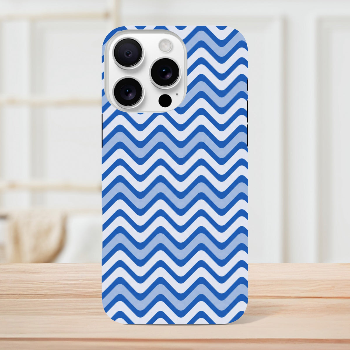 Blue and white retro zigzag iPhone case with glossy finish, offering tough dual-layer shock absorption for daily impact resistance.