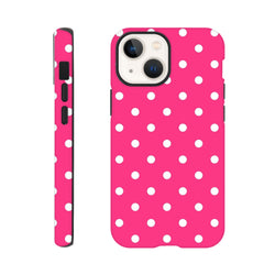 Hot pink dual-layer iPhone case with white polka dots. Rugged TPU protection guards against daily shock and impact for fast-paced use.
