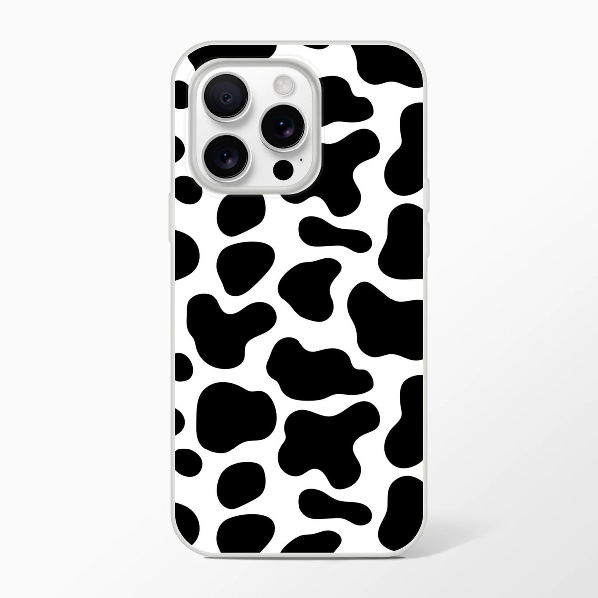 Black and white cow-print iPhone case for iPhone 13–16 with bold Y2K animal design.