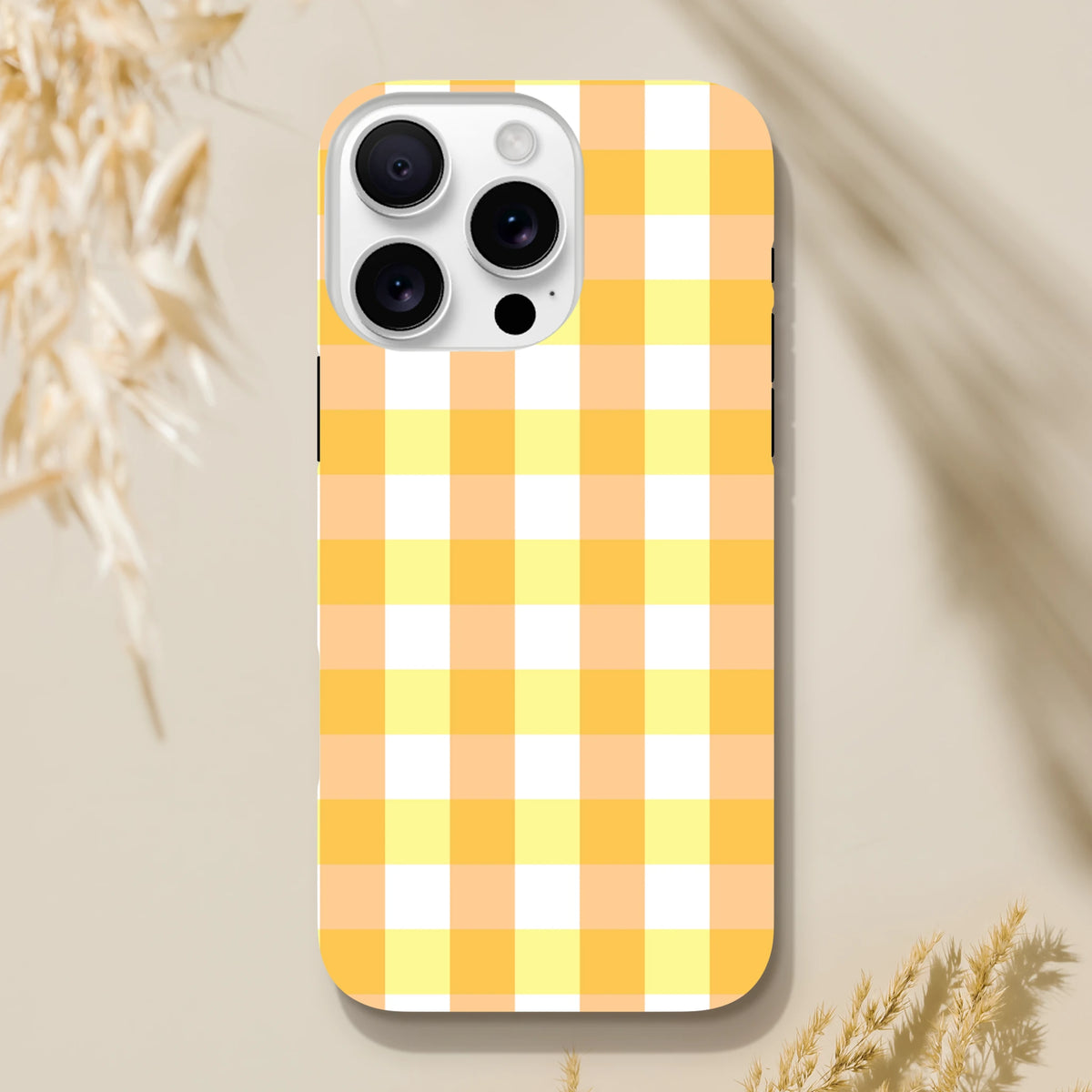 Retro yellow gingham checkered tough iPhone case providing secure protection with a nostalgic plaid design for modern smartphones.
