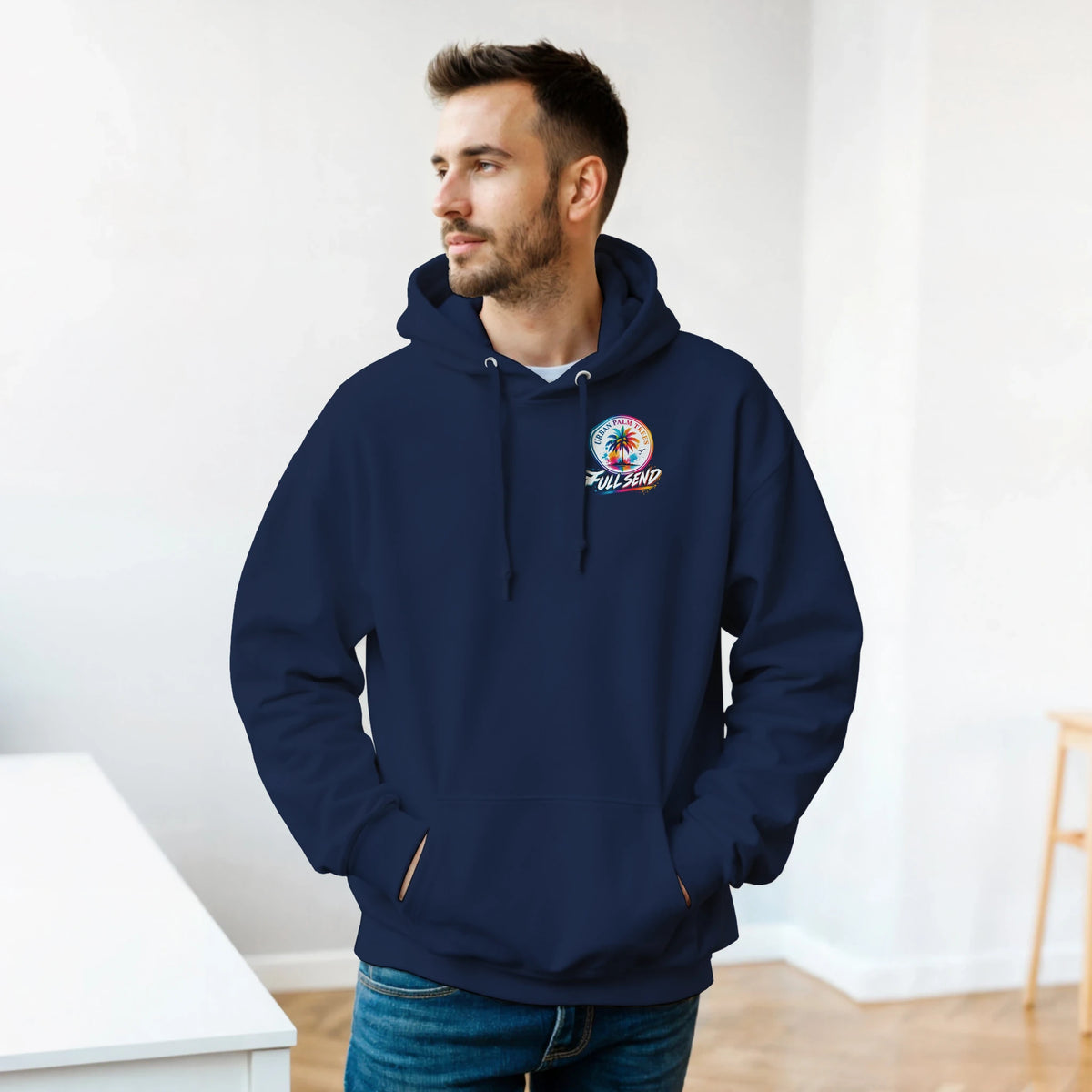Man in navy petrolhead hoodie featuring colorful "Full Send" palm tree logo. Modified car culture sweatshirt for streetwear.