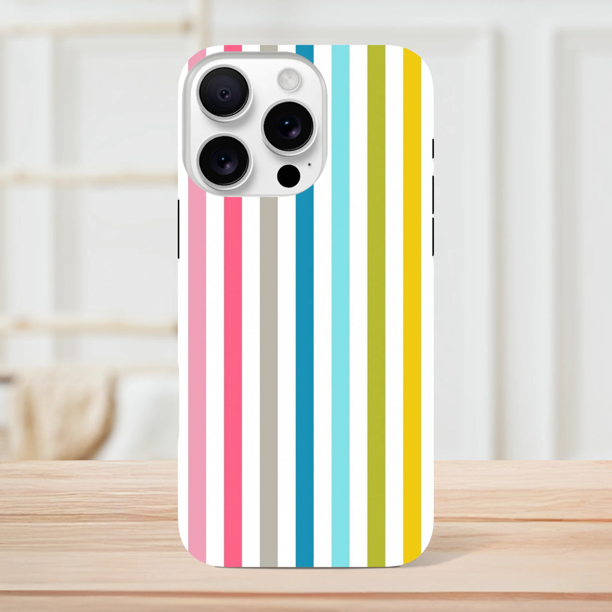 Retro rainbow vertical stripe tough iPhone case featuring vibrant pink, blue, yellow, and green accents on a white background.