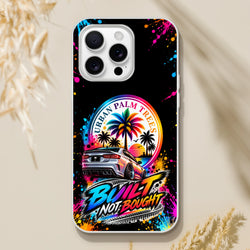 "Built Not Bought" iPhone case featuring a silver car, urban palm trees sunset, and vibrant neon paint splatter art for petrolheads.