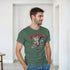 Man wearing a Gothic Angel graphic T-shirt in green-gray, featuring a winged guardian angel and red Gothic lettering.