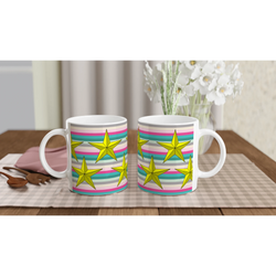 Two pastel stripe mugs with yellow stars and colorful bands on a wooden table.
