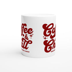 White ceramic mug featuring red "Coffee & Chill" slogan graphic on glossy surface.