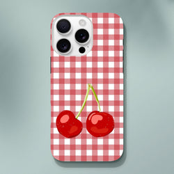 Red and white gingham iPhone case featuring a cute pair of glossy red cherries on green stems.