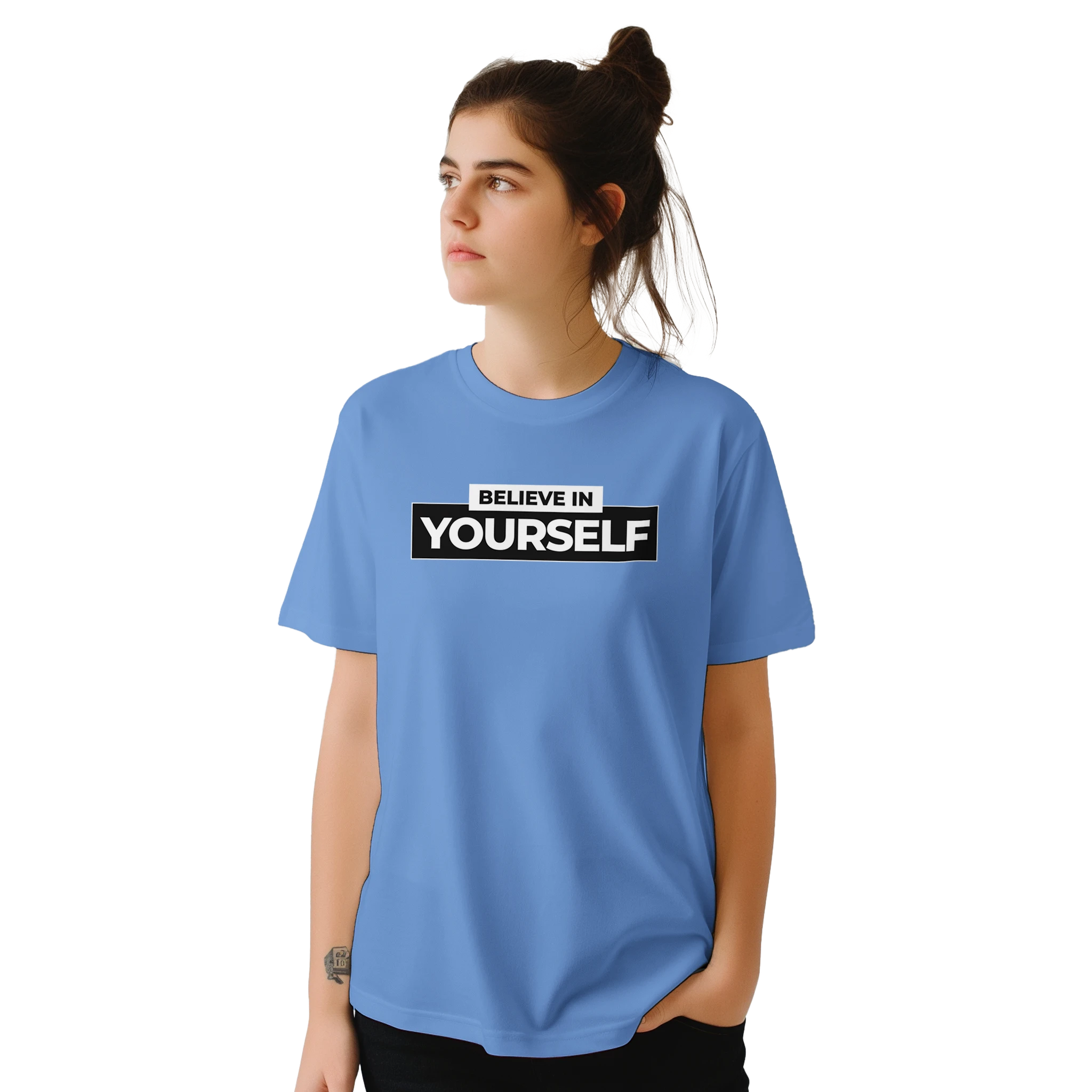Woman wearing a blue Believe In Yourself T-shirt with bold retro slogan.