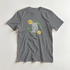 Gray women's graphic tee with white Good Vibes Only vertical text inside a green leafy wreath and yellow roses.