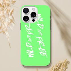 Lime green iPhone case with white Wild and Free Y2K slogan text and tough shock-absorbing shell design.