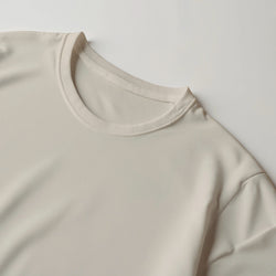 Beige Paradise women's graphic T-shirt, soft cotton blend, crew neck close-up.
