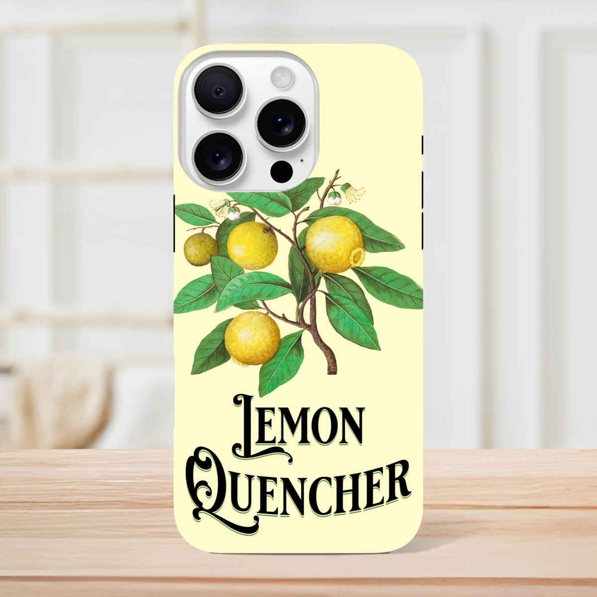 Vintage lemon tough iPhone case featuring retro botanical fruit illustration and "Lemon Quencher" text on a pale yellow background.