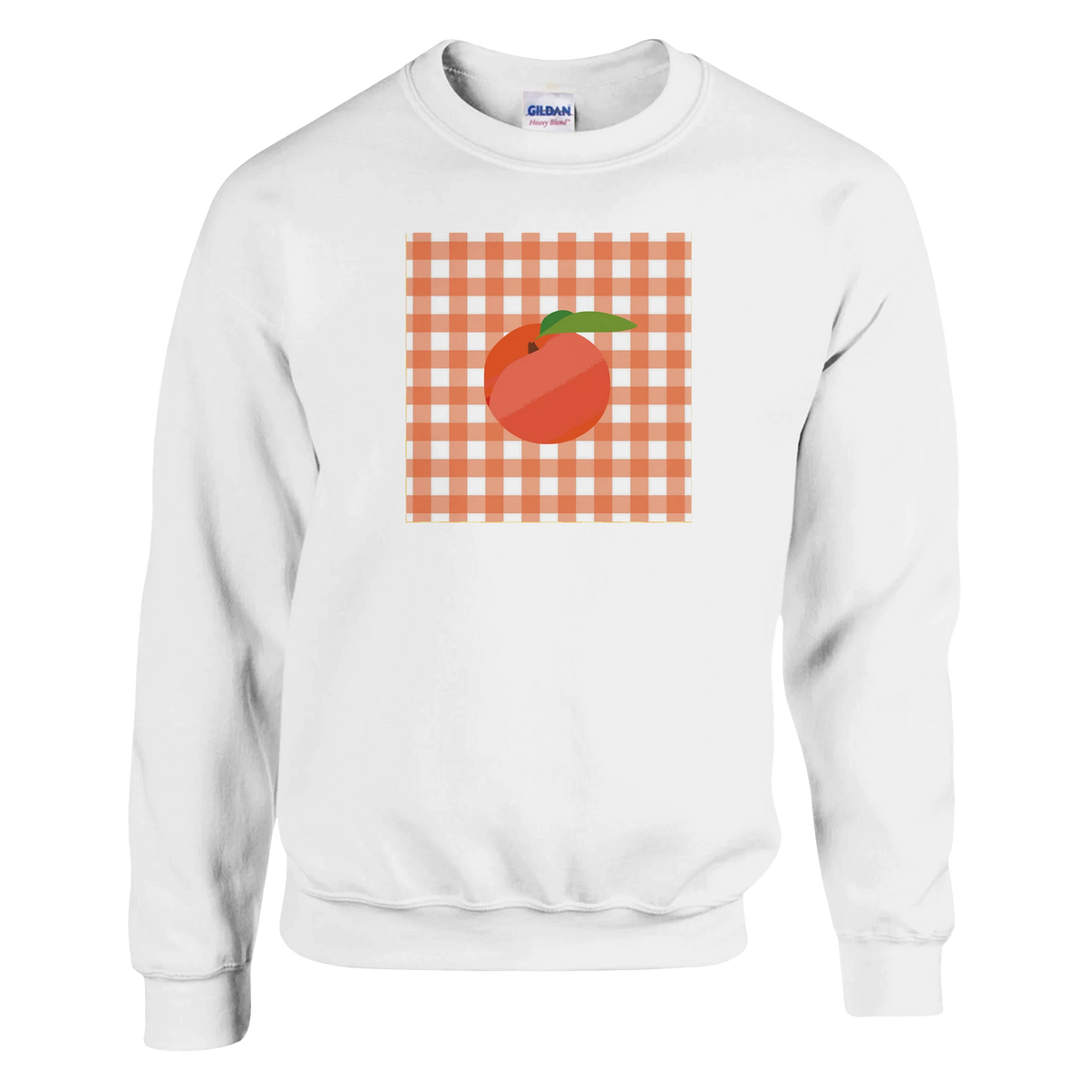 White sweatshirt with an orange gingham square and a peach graphic, retro-inspired women's jumper.
