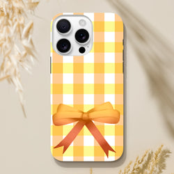 Yellow gingham iPhone case featuring a 3D orange bow, cute coquette street style cover for iPhone 13-16.