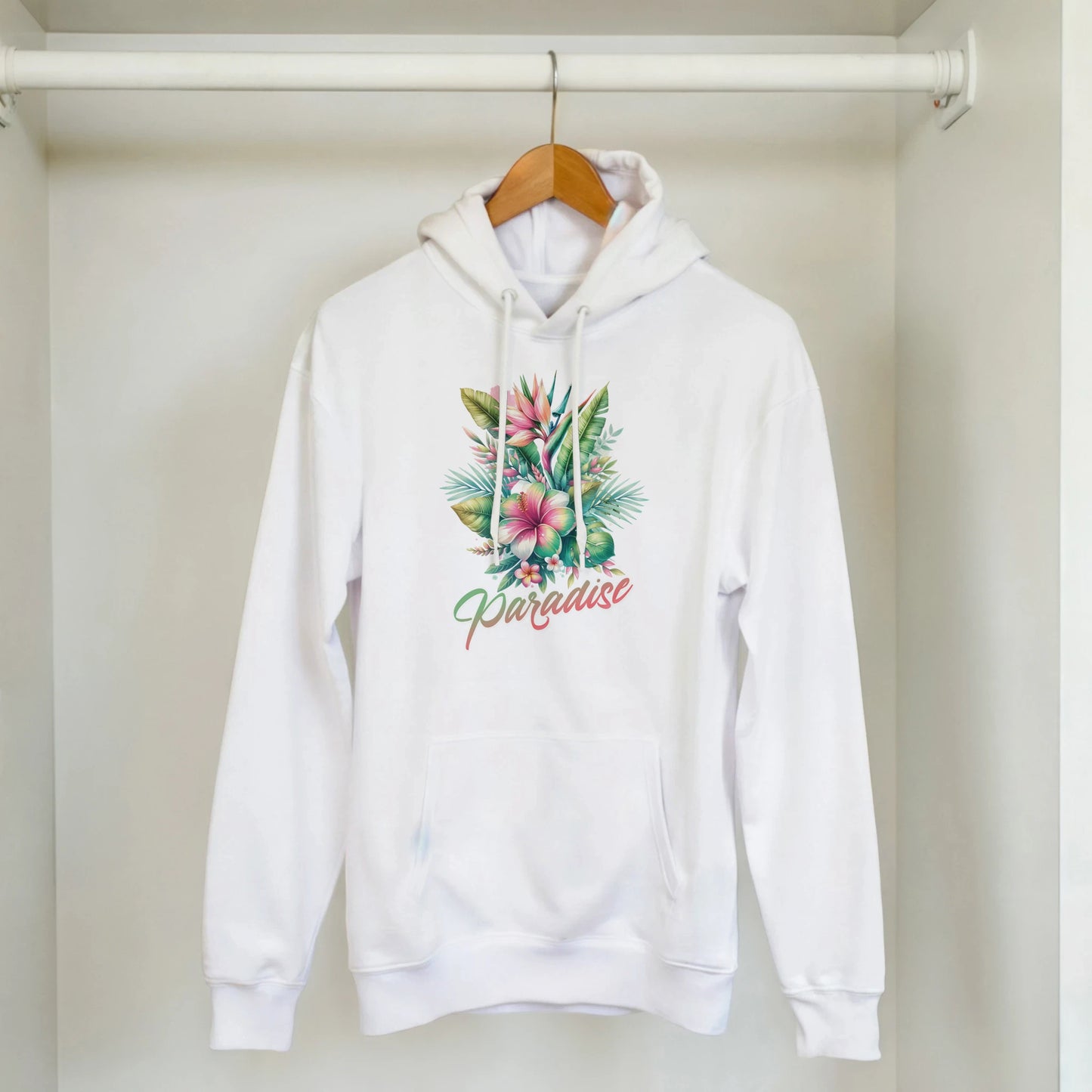 White women's Y2K Paradise Hoodie with tropical palm leaves, pink floral graphic, and Paradise script.