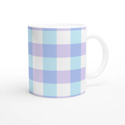 Pastel blue gingham ceramic mug with lavender accents and white handle.