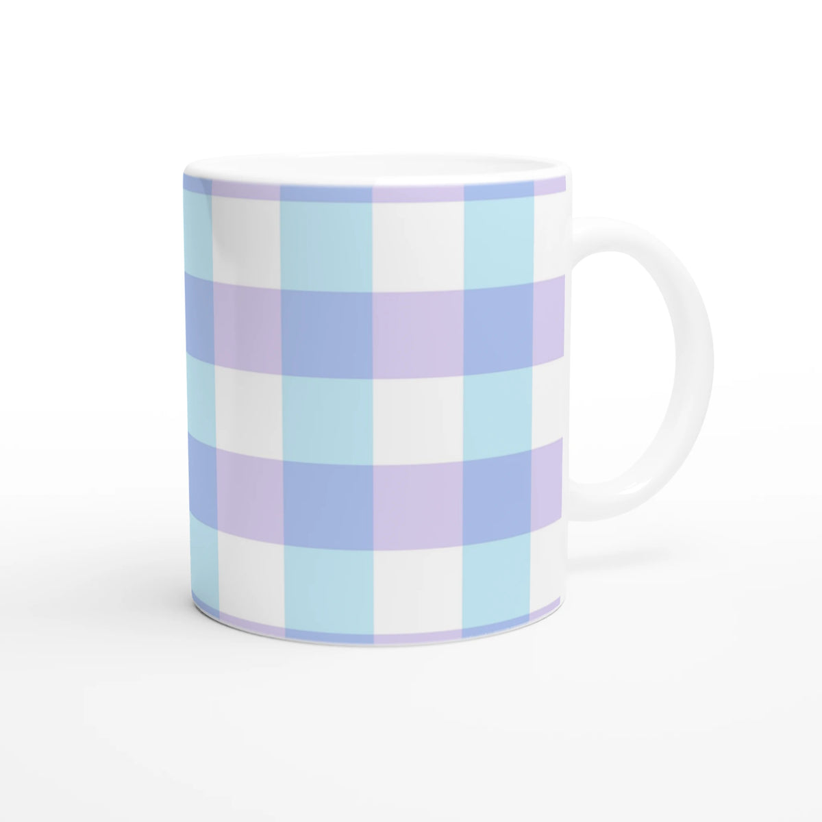 Pastel blue gingham ceramic mug with lavender accents and white handle.