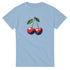 Cherries graphic t-shirt for women in light blue with red cherries and green leaves, soft cotton blend.