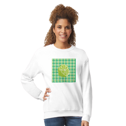 Woman wearing a white sweatshirt featuring a lime graphic on a green gingham panel.