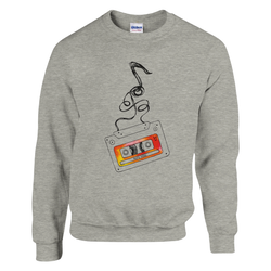 Grey sweatshirt featuring a retro cassette tape graphic with unspooling black tape and colorful "90s Hits" label. Vintage music streetwear.