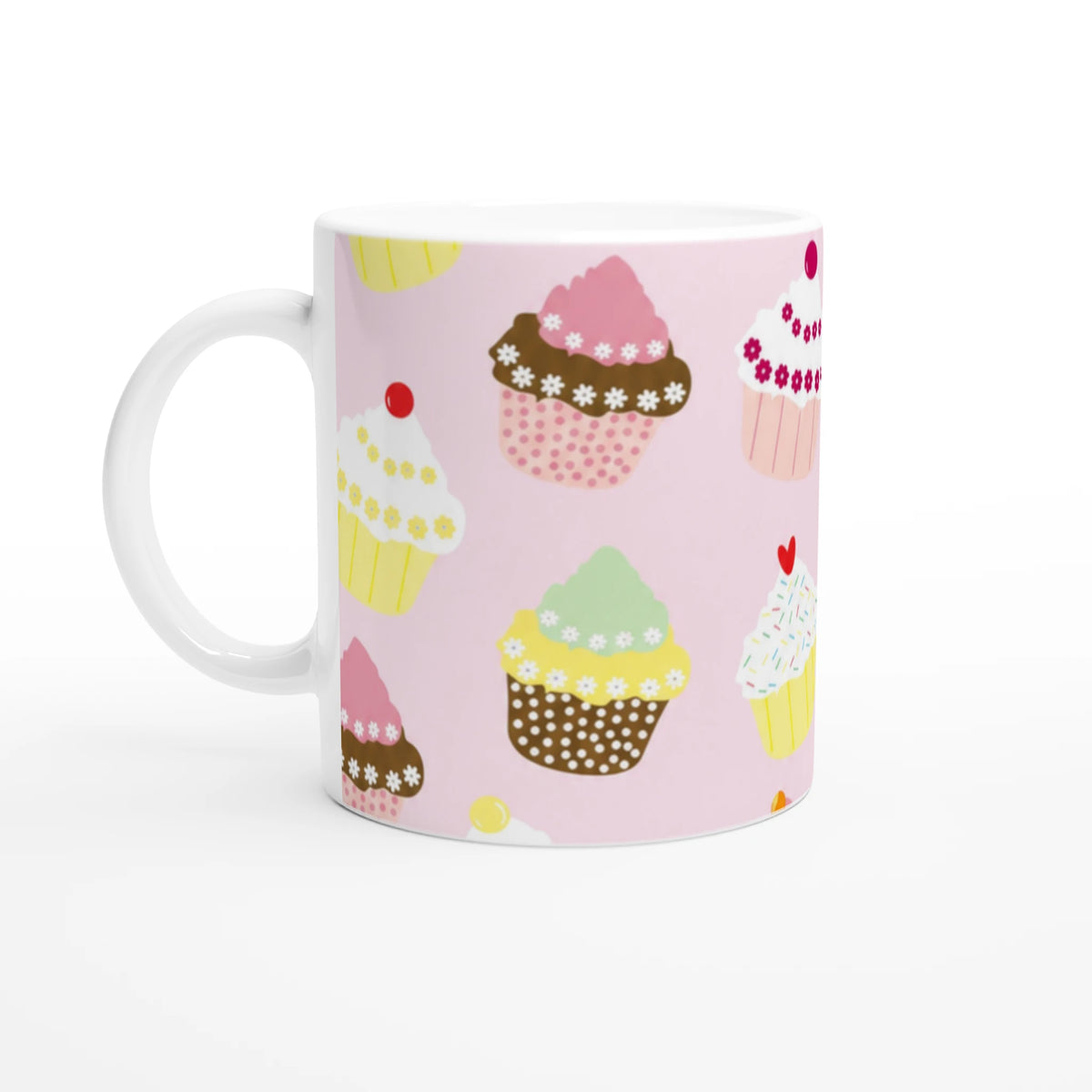 Cute pastel cupcake mug with kawaii frosted cupcake pattern on a ceramic coffee cup.