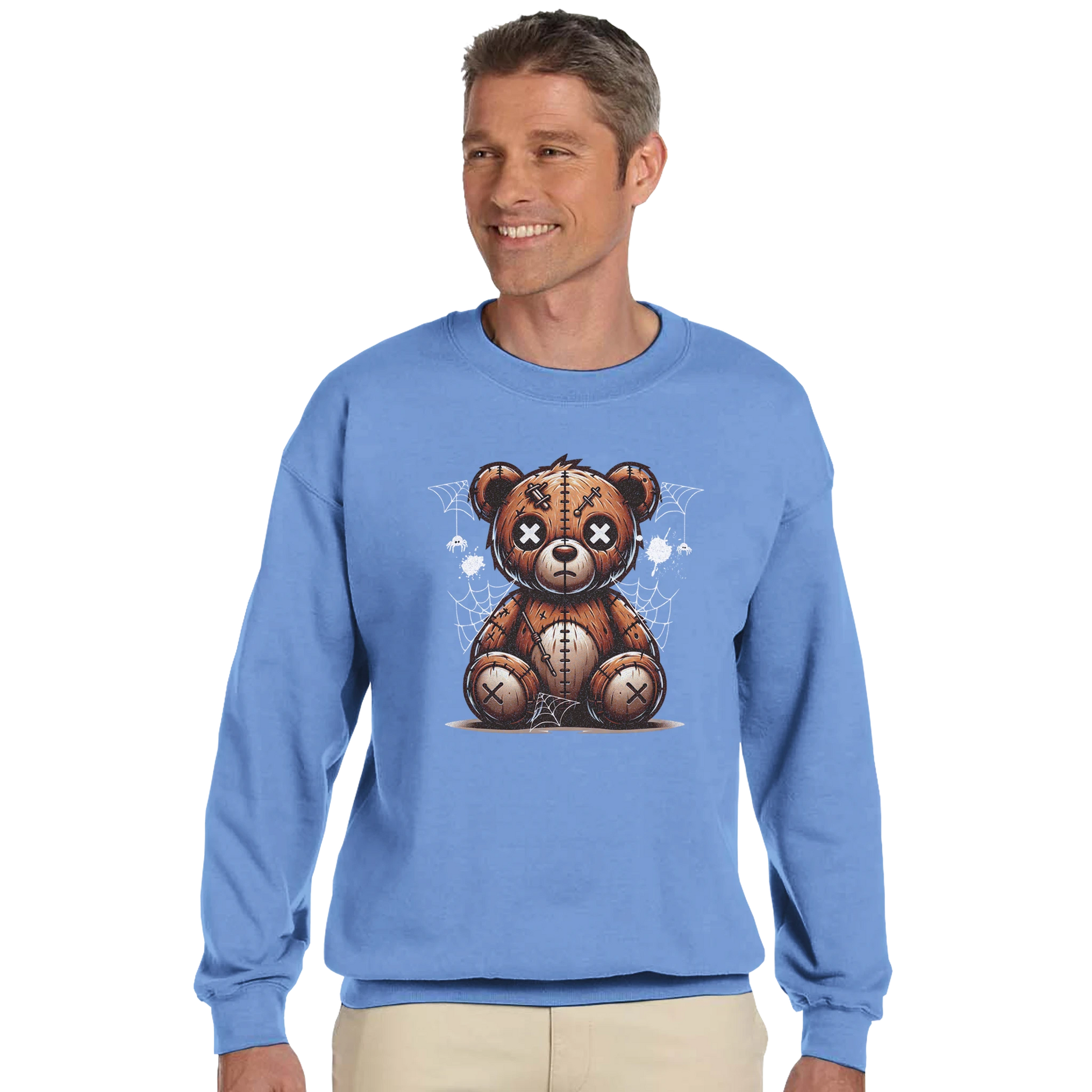 Man wearing a blue men's graphic sweatshirt with a teddy bear graphic on a white background.