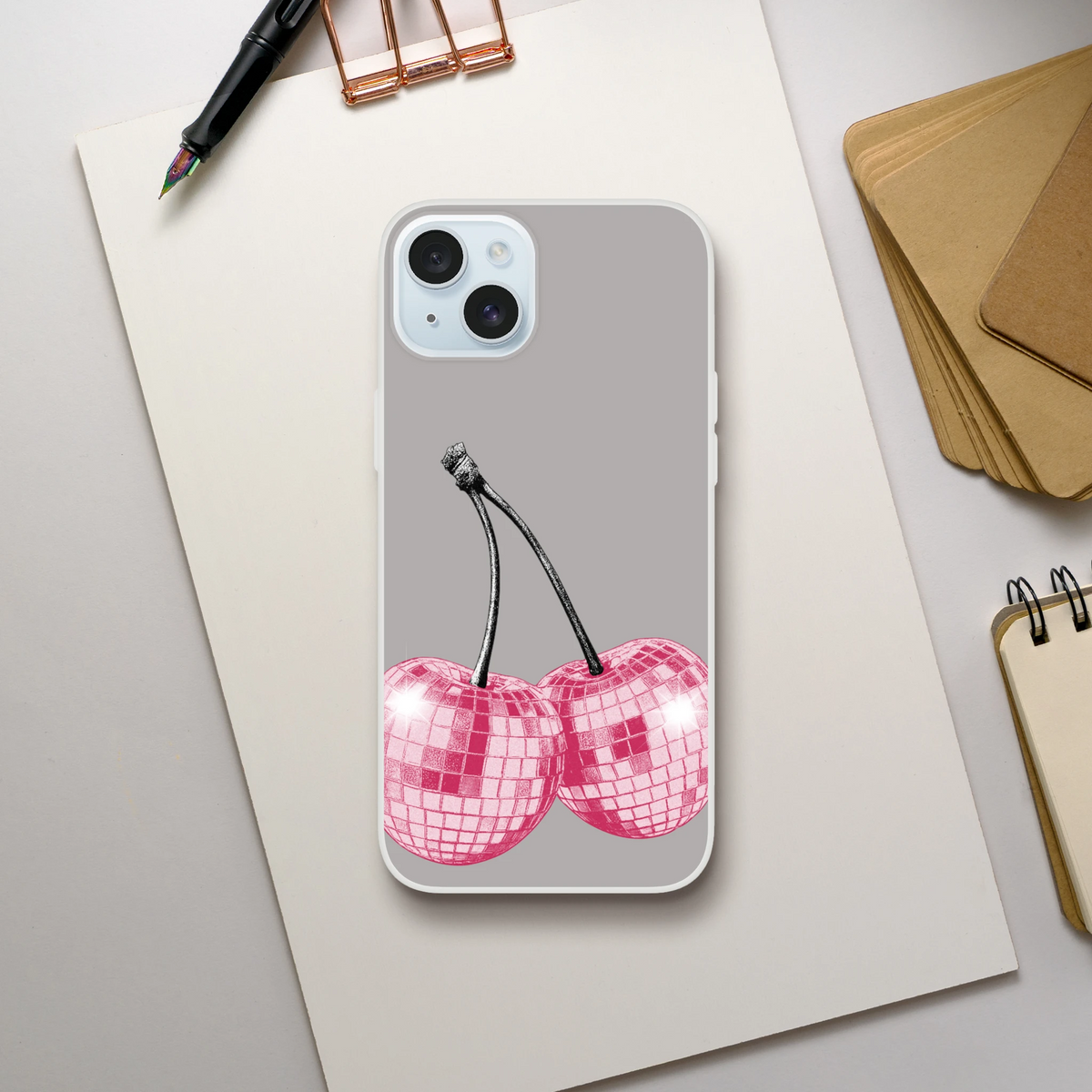 Y2K glitter cherries iPhone case with gray matte back, black stem graphic, and pink grid-heart accents
